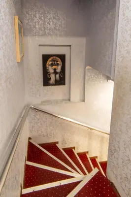 a stairway with a christmas gift in a room at Boutique Sultan Hotel & Restauran in Istanbul