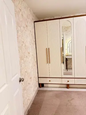 a room with a mirror and a white cabinet at Great Location Terrace Apartment 15 in Istanbul