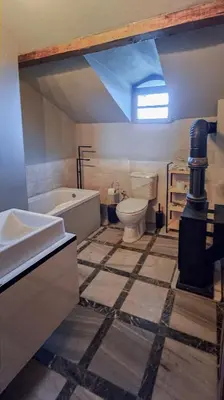 a bathroom with a toilet and a tub and a sink at Villa Nest Uludağ in Hüseyinalan
