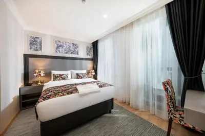 a hotel room with a bed and a window at Bond Hotel in Istanbul