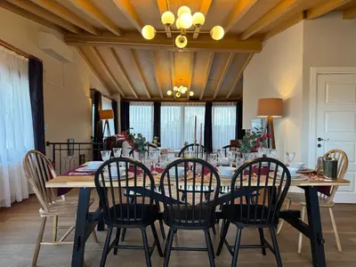 a dining room with a table and chairs at Iconic Sea View Duplex w Terrace in Balat in Istanbul