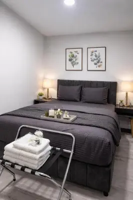 a bedroom with a large bed with towels on it at Signature Suites in Taksim in Istanbul