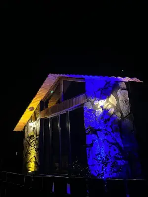 a house with purple lights on the side of it at Sakaryabungalow in Geyve