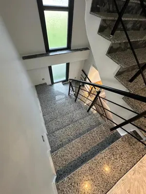 a staircase in a house with a window at Villa life in Gümüşyaka
