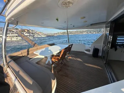 a table and chairs on the deck of a boat at Rotavira YAT KİRALAMA PLATFORMU in Istanbul