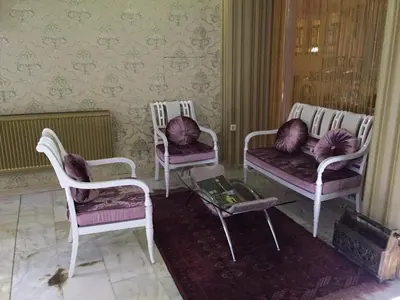 a room with three chairs and a coffee table at Hotel Grand Mark in Istanbul