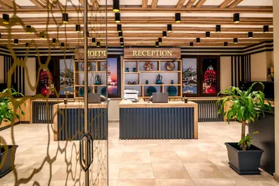 a lobby of a store with a reception desk at Kupeli Hotel in Istanbul