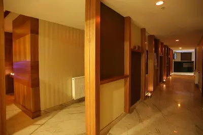a hallway of a house with wooden walls at Mard-inn Hotel in Istanbul
