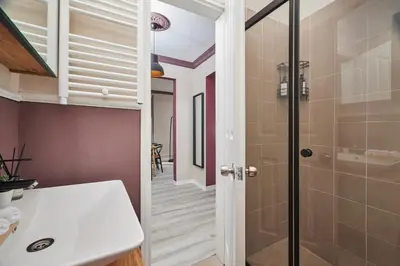 a bathroom with a shower and a sink at Modern 2BR in Nisantasi Area Balconies & AC in Istanbul