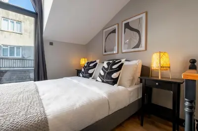 a bedroom with a bed and a window at Central 4-Bedroom House with Private Terrace and 2 Bathrooms in Istanbul