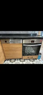 a cabinet with a television on top of it at nişanesi sita in Istanbul
