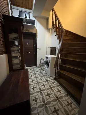 a room with a staircase and a floor with a stair case at Naila ahmadreza in Istanbul