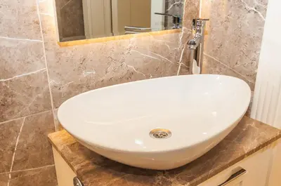 a white sink sitting on a counter in a bathroom at Park Grazza Hotel in Istanbul