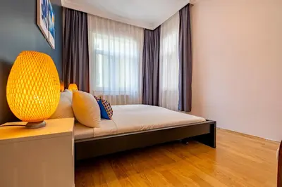 a bedroom with a bed and a window at 3-Bedroom 2-Bathroom, Centrally Located Ground-Floor Apartment -No Stairs in Istanbul