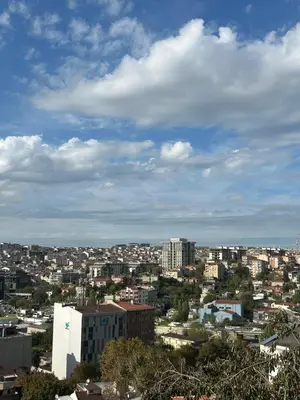 a view of a city under a cloudy sky at Apartment with a View Taksim-Beyoğlu1 in Istanbul