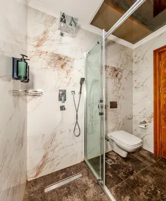 a bathroom with a shower and a toilet at Vox Matara Elite House in Istanbul