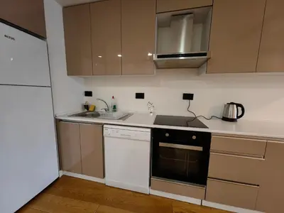 a kitchen with a sink and a stove top oven at Apartment at Prime Istanbul in Istanbul