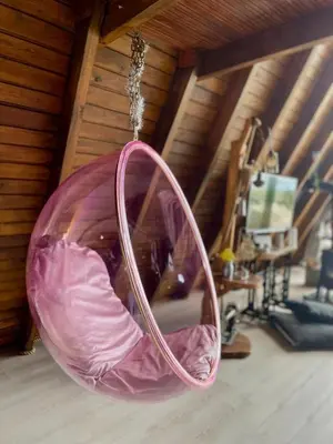 a pink hanging chair in a room at Sapanca Liva Bungalov in Sapanca