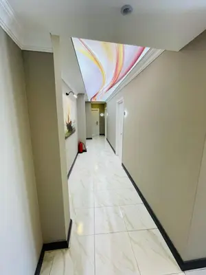 a hallway with a ceiling with a painting on it at Old City Viva Hotel in Istanbul