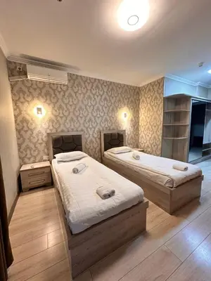 a bedroom with two beds in a room at Elma hotel in Istanbul