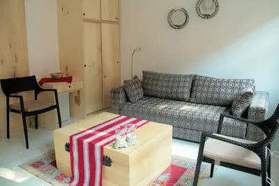 a living room with a couch and a table at Newly-renovated apartment 2 in Istanbul