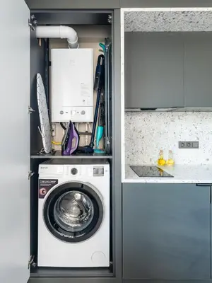 a kitchen with a washing machine in a kitchen at Historic34 Modern Cozy Apartment Golden Horn in Istanbul