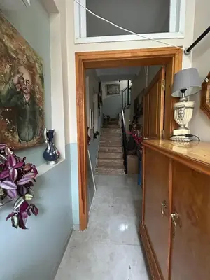 a hallway of a house with a stairway and a hallway at Bohemian Antique House in Colorful Balat in Istanbul