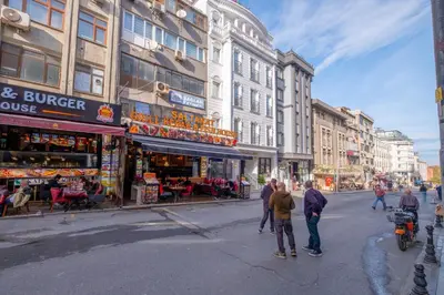 a group of people standing on a city street at Çatal hostel in Istanbul