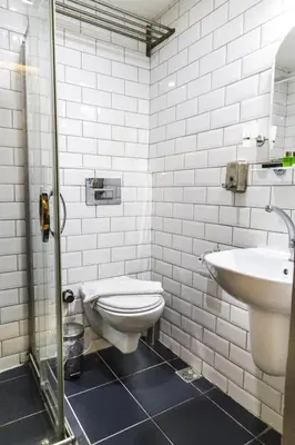 a bathroom with a toilet and a sink at Stories Of Galata in Istanbul