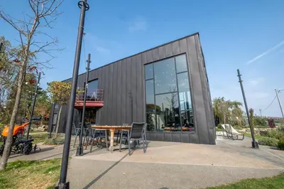 a building with a table and chairs in front of it at Baraka 1 in İznik