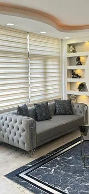 a living room with a couch in a room at Ekinci Plaza in Istanbul