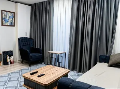 a living room with a couch and a coffee table at House in Istanbul