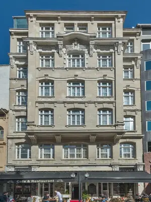 a tall building with a lot of windows at Alpek Hotel in Istanbul