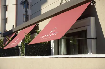a red sign on the side of a building at Cityloft 24 in Istanbul