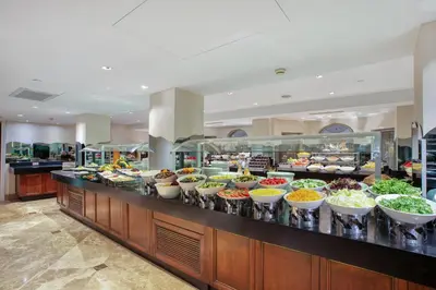a buffet line with lots of bowls of food at Crowne Plaza Istanbul - Old City by IHG in Istanbul