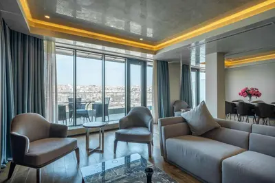 a living room with a couch and chairs and a table at Arise Hotel Golden Horn in Istanbul