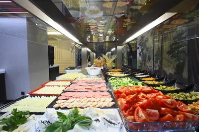 a buffet line with many different types of food at The Hotel Beyaz Saray Old City in Istanbul