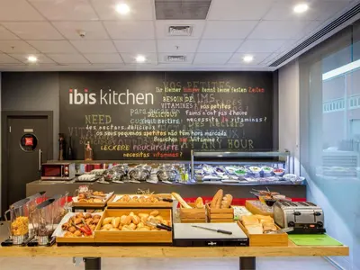 a bakery with a sign on the wall with bread at Ibis Istanbul West in Istanbul