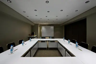a conference room with a long table and chairs at The Cettia Istanbul in Istanbul