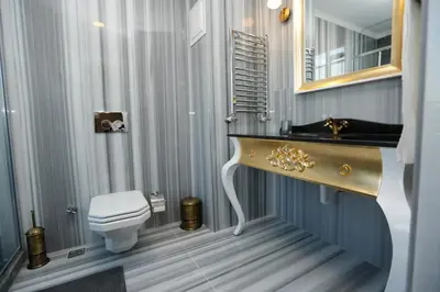 a bathroom with a sink and a toilet at Art Nouveau Pera in Istanbul