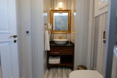a bathroom with a sink and a mirror at Art Nouveau Pera in Istanbul