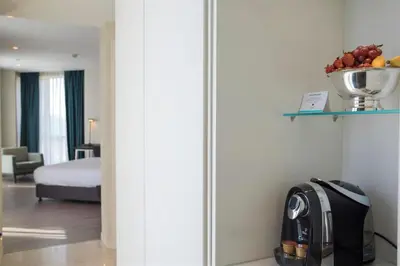 two images of a room with a hotel room at Wish More Hotel Istanbul in Istanbul