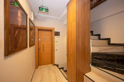 a hallway with a staircase and a door in a room at Marida Suit - Istanbul Taksim in Istanbul