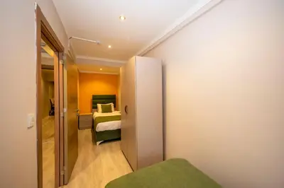 a small room with a bedroom with a bed at Marida Suit - Istanbul Taksim in Istanbul