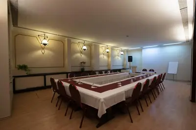 a large conference room with a large table and chairs at Kadıköy Rıhtım Hotel in Istanbul