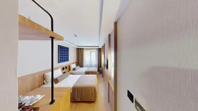 a hotel room with a bed and a desk at Istanbul River Hotel in Istanbul