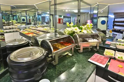 a buffet line with many different types of food at Budo Hotel in Istanbul