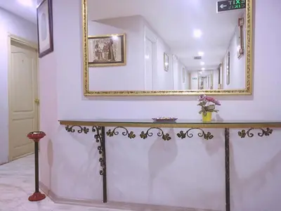 a mirror on a wall in a room at Masal Otel in Kocaeli