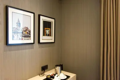 a hotel room with two pictures on the wall at Cityloft 81 in Istanbul