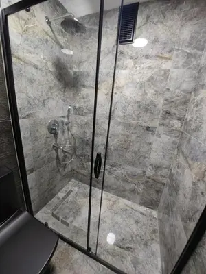 a shower with a glass door in a bathroom at Star Hotel in Istanbul